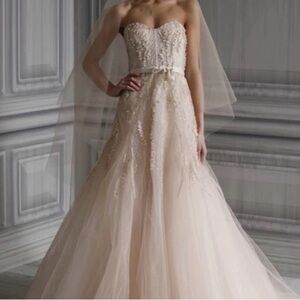 Size 6 (tailored to more like a 4) Monique Ihuiller Candy dress in blush.